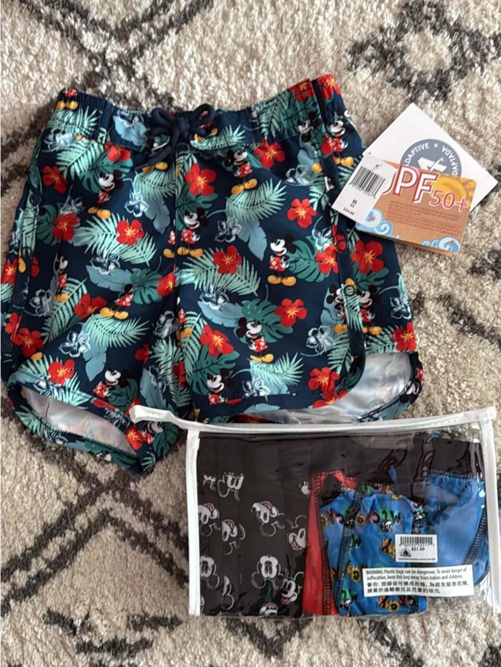 Disney Navy Swim Shorts with Red and Green Tropical Accents